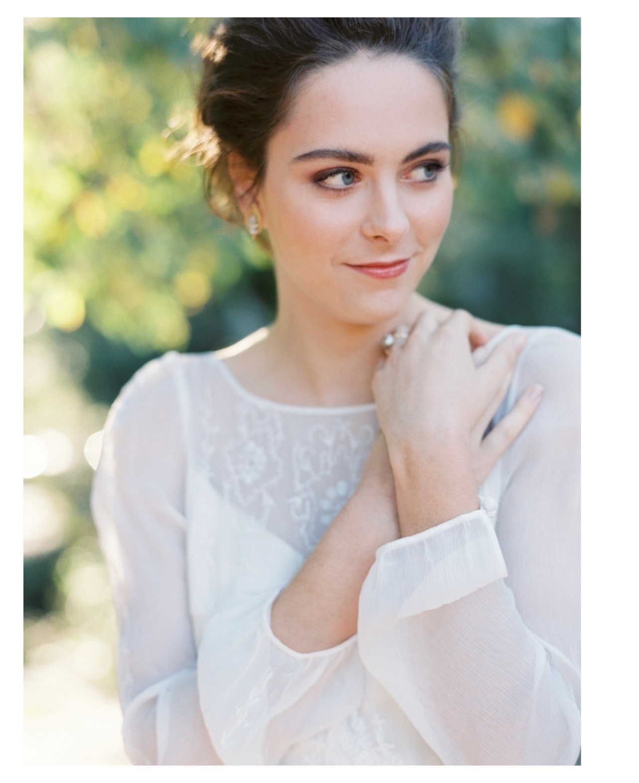 gorgeous natural makeup bride with soft flowless effortless updo in Central Park NYC. 