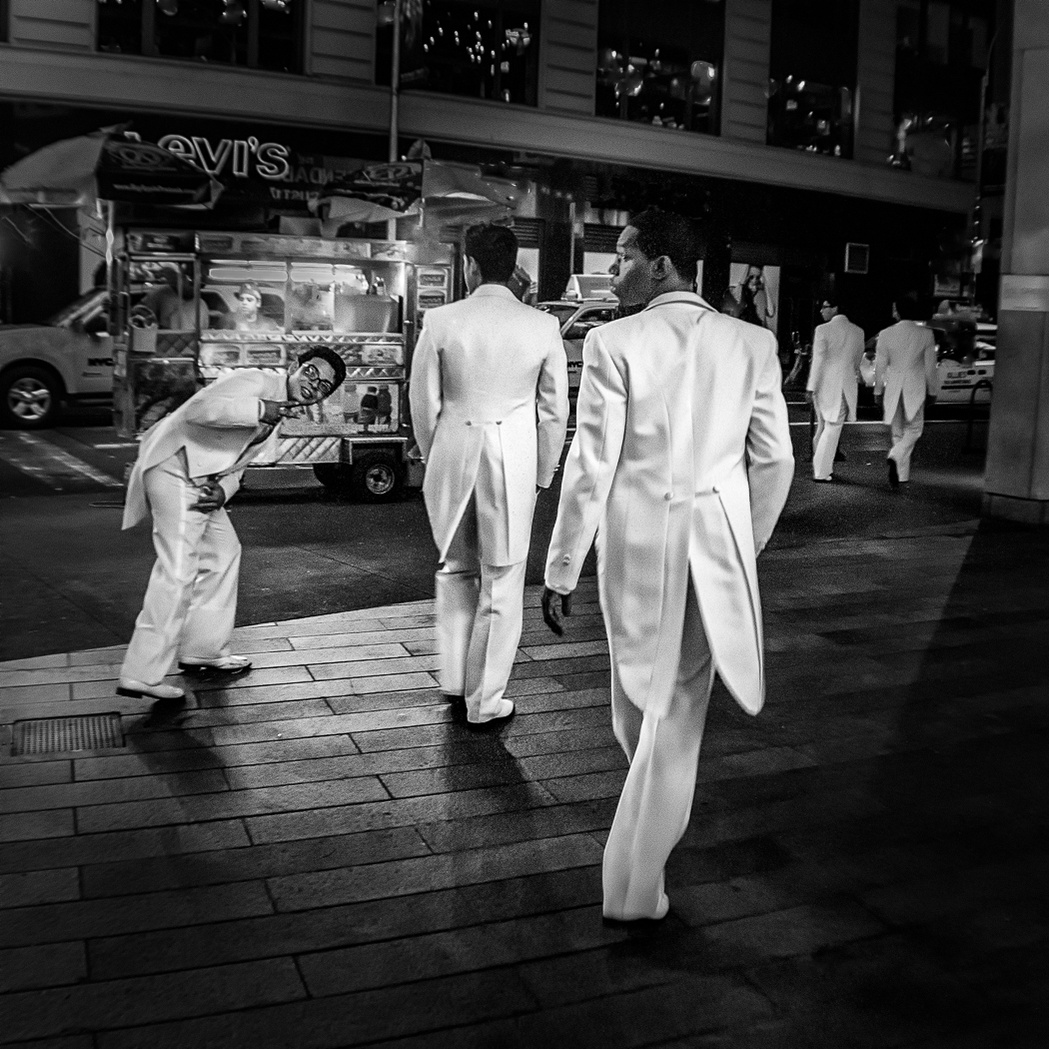 5 cool dancers stroll off after a photoshoot on Times Square