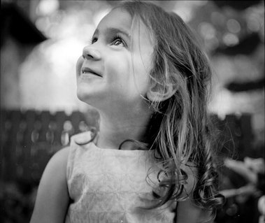 Flower girl, photographed at an outdoor wedding shot on medium format film and held in country Victoria, Australia, near Albury-Wodonga.