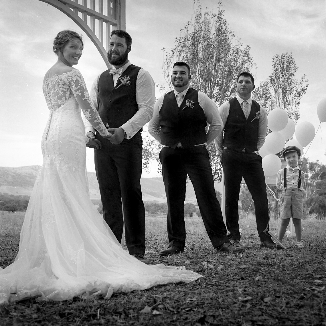 An outdoor wedding shot on medium format film and held in country Victoria, Australia, near Albury-Wodonga.