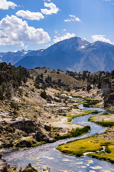 Hot Creek River (California) meanders with mountains in the background.