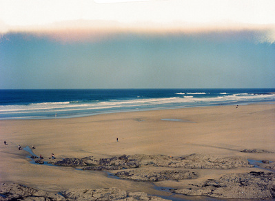 A beach in the UK, shot on film with analogue distortions.  