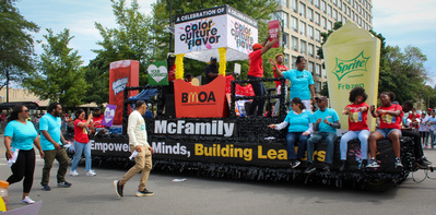 The Black McDonald’s Operators Association shines at the 93rd Bud Billiken Parade, celebrating African American culture and supporting youth with their vibrant presence and commitment to the community.