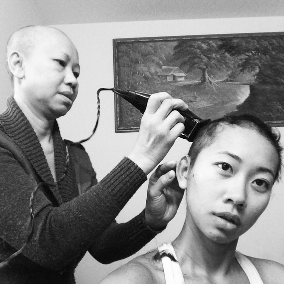 Black and white image of my Mama shaving my hair off in support of Cancer.