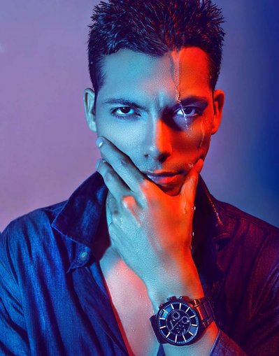 A young model in colourful light photographed by a commercial photographer in Orlando
