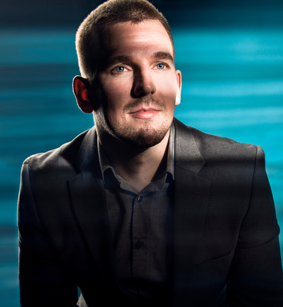 A young male actor having his headshot image taken in Orlando