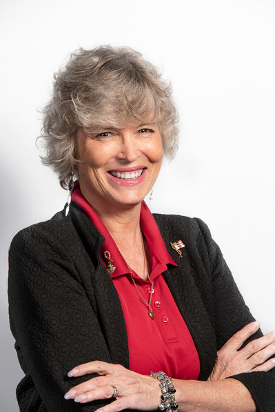 Professional headshot of a businesswoman in Orlando