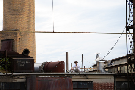 A self-portrait on the rooftop of a massive abandoned paper mill in New Jersey.