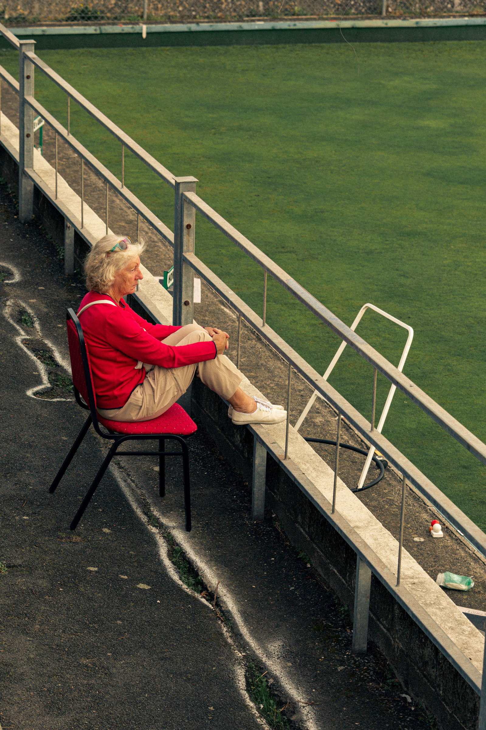 Newquay West End Bowls Club playing at their location above the Newquay harbour, in Cornwall, Western England.