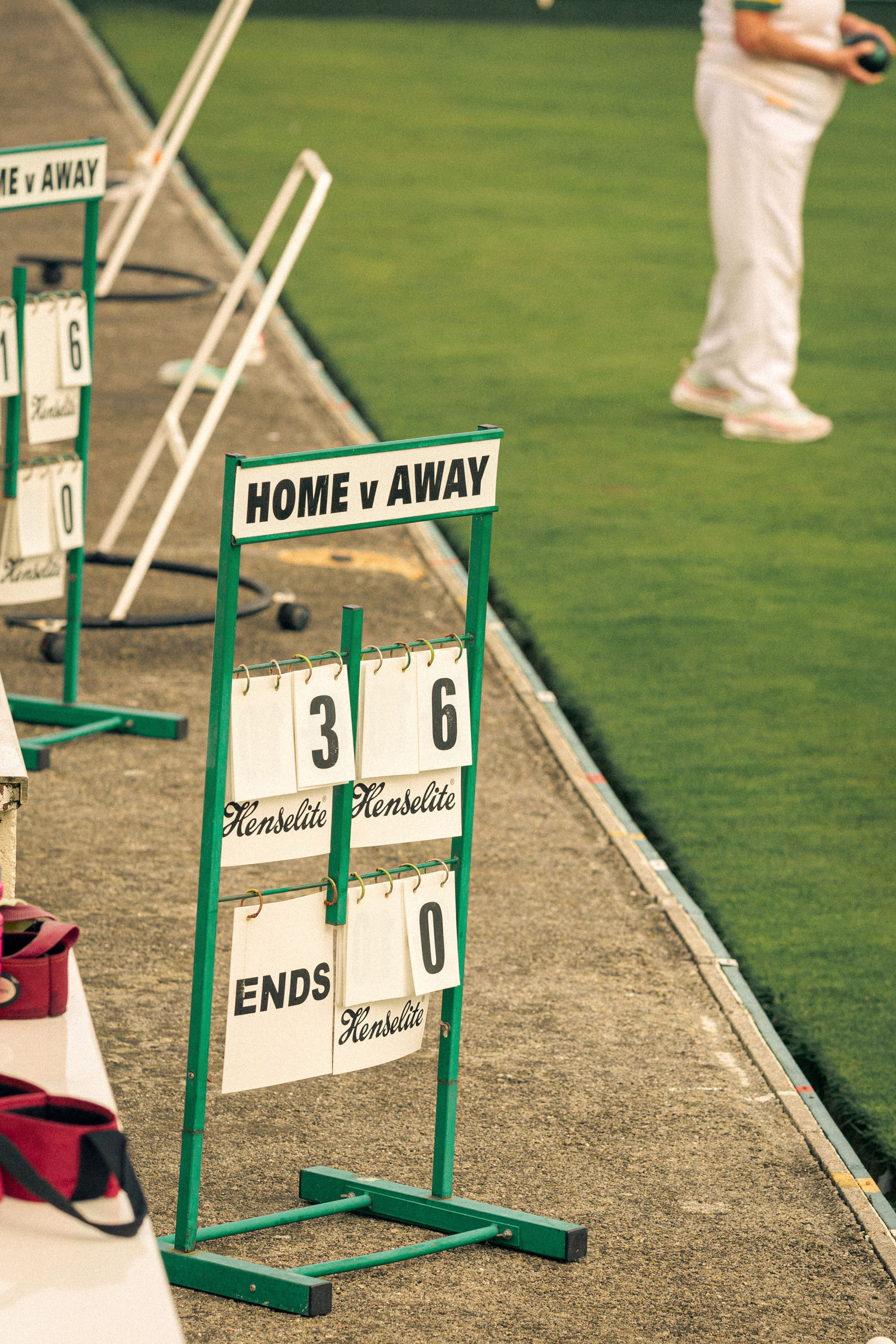 Newquay West End Bowls Club playing at their location above the Newquay harbour, in Cornwall, Western England.