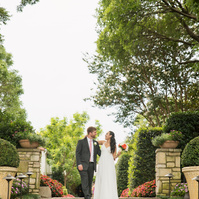 Intimate wedding portraits showcase the timeless beauty of Dallas Arboretum's landscapes.