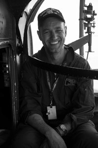 Airforce pilot smiling for a photograph, black and white