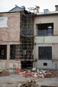 Scaffolding holding up building floors.