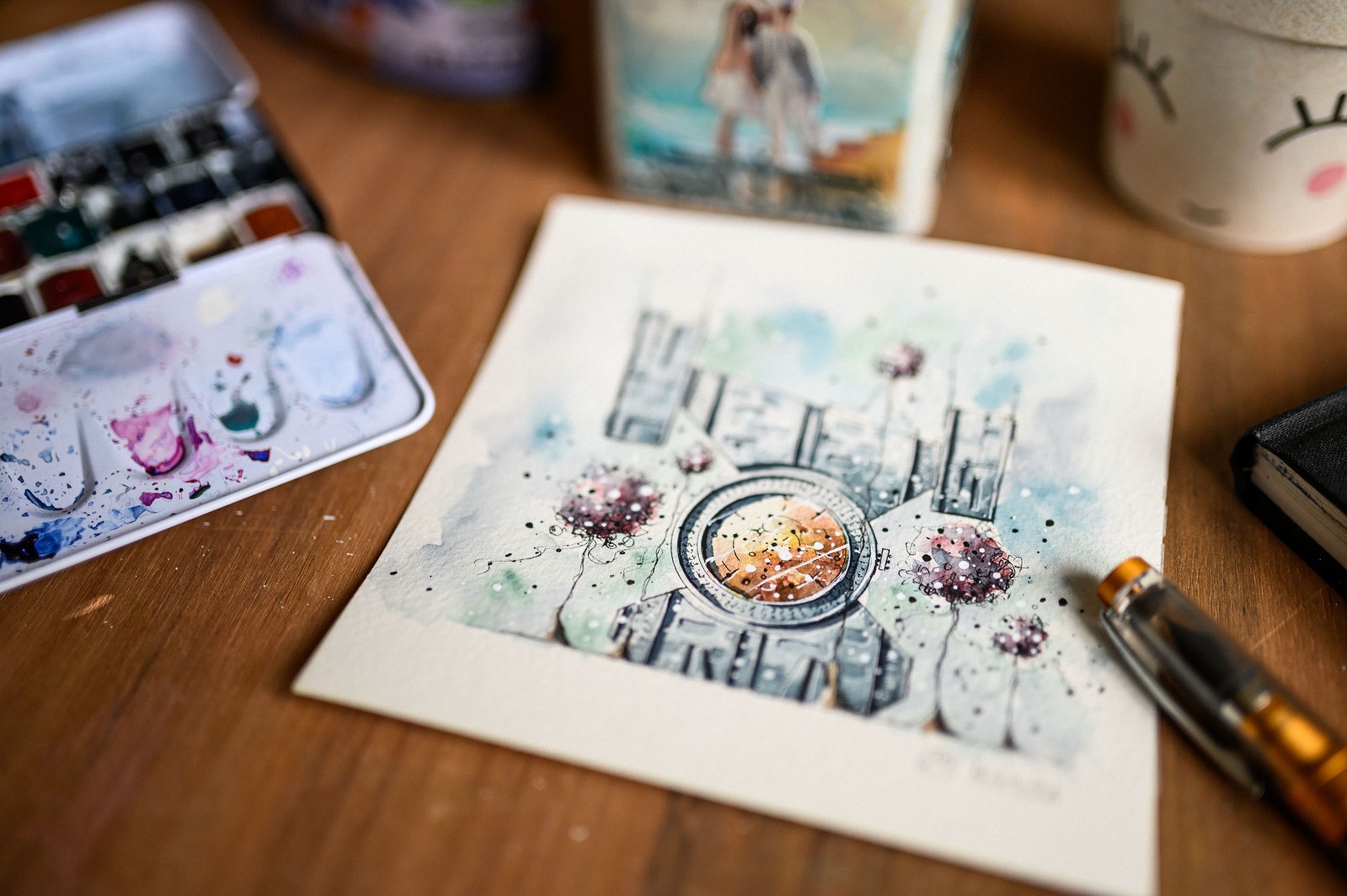 Photographie d'un dessin réalisé à l'encre et l'aquarelle par Lotfi Dakhli