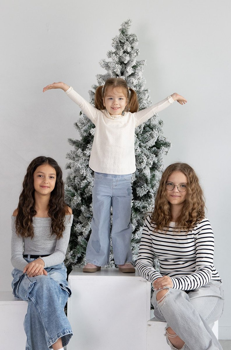 Sibling joy in holiday portrait session