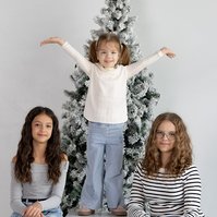 Sibling joy in holiday portrait session