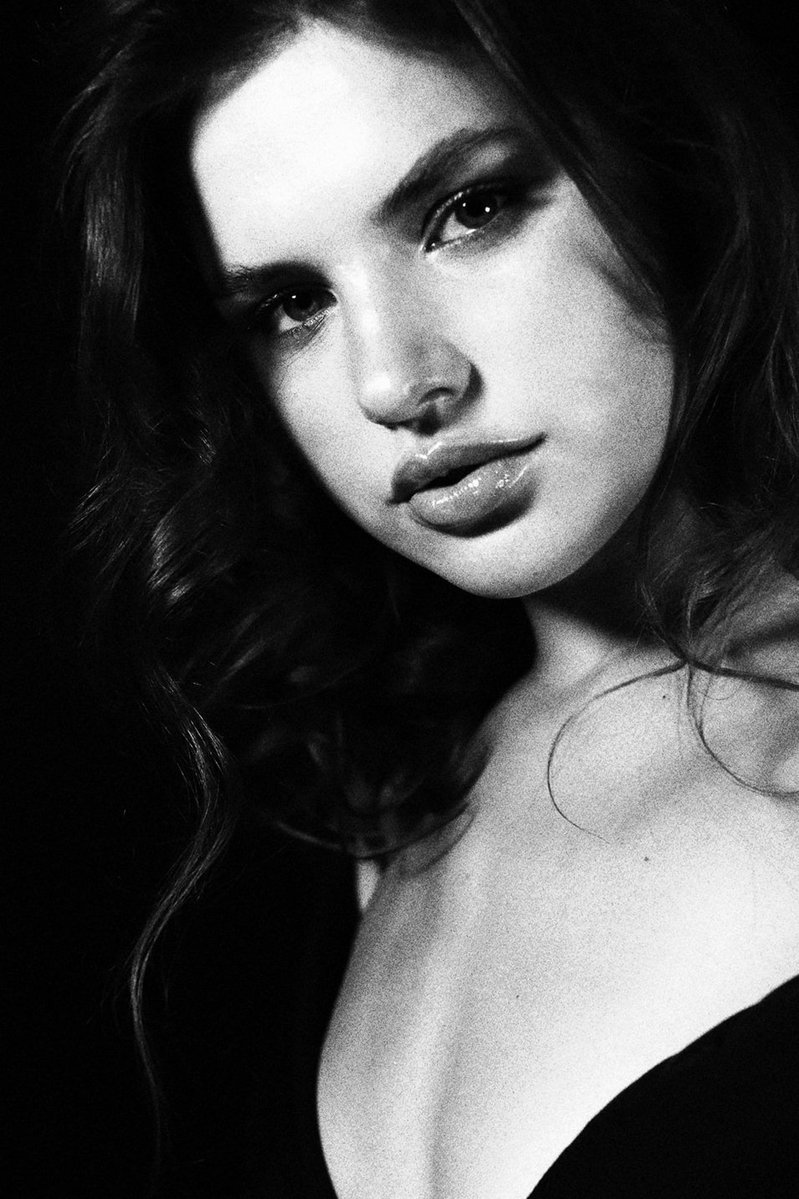 Bold feminine beauty with direct gaze