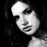 Bold feminine beauty with direct gaze