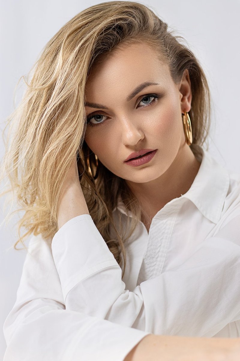 Studio-style female portrait with elegance