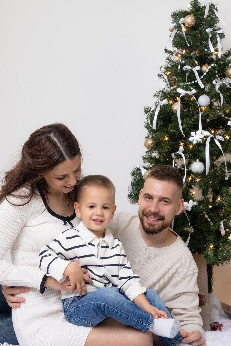 Happy family in studio holiday setup
