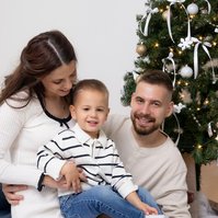 Happy family in studio holiday setup
