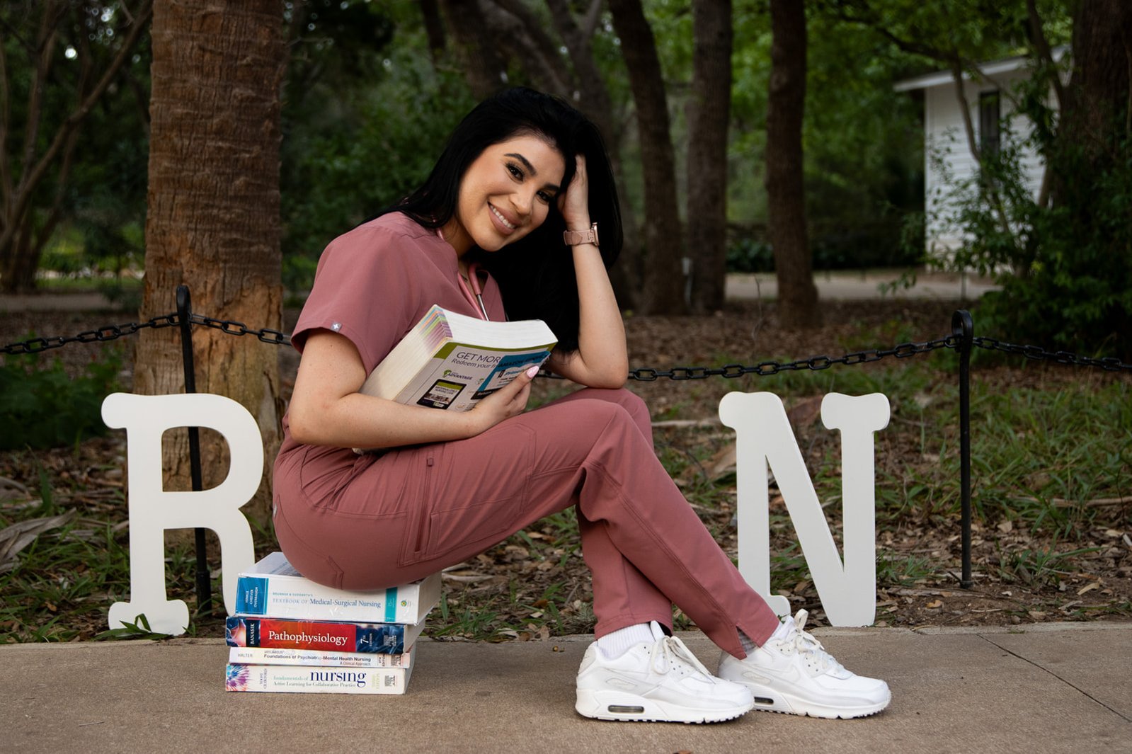 Nursing school grad celebrating RN milestone