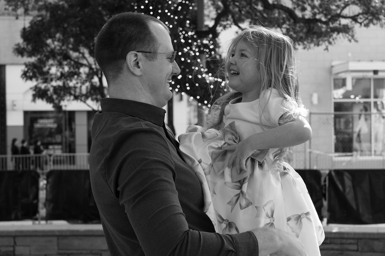 Father-daughter love captured in monochrome