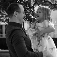 Father-daughter love captured in monochrome