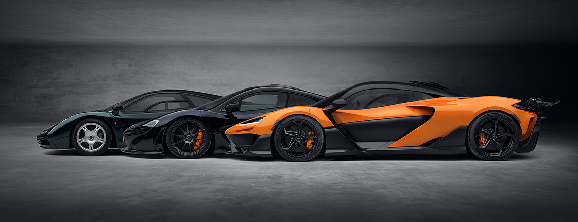 McLaren W1 supercar in a sleek urban setting. enquire with west2east luxury
