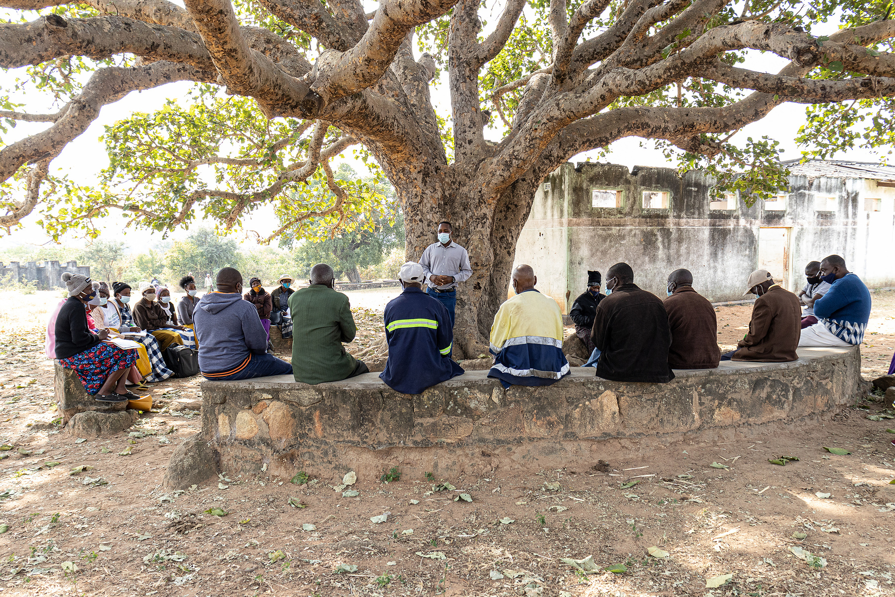 MAY 31, 2021: Martin Chauke, a Business Development Officer based at the Takunda district office in Zaka District, introduces the activity and sensitizes local leadership in Ward 14 on the community vision process. The local leadership present included th