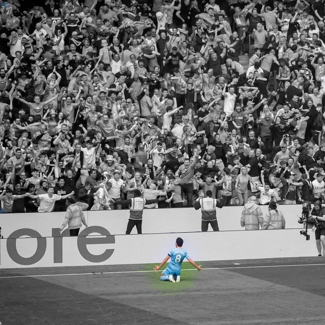 Gündoğan celebrates the game-winning, title-winning goal for Manchester City against Aston Villa in 2022. 