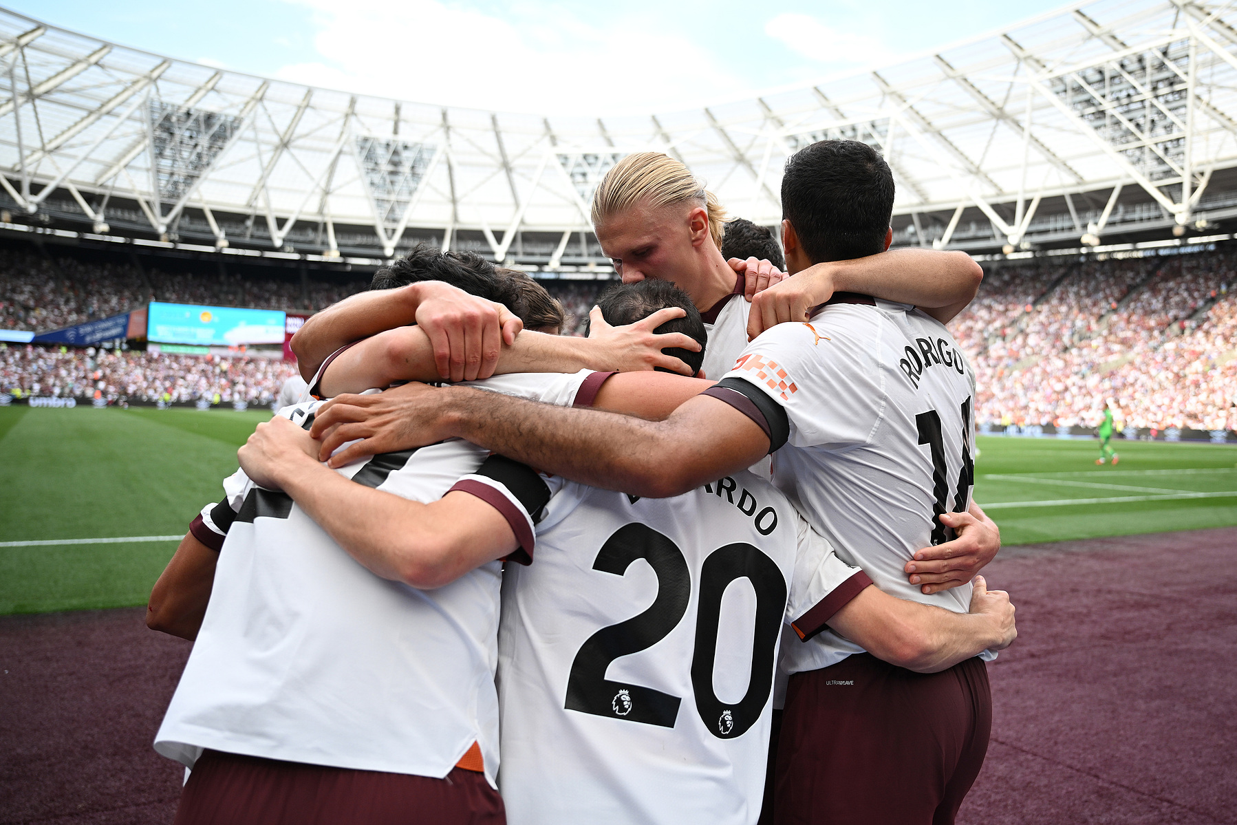 City players celebrate scoring against West Ham in the Premier League.
