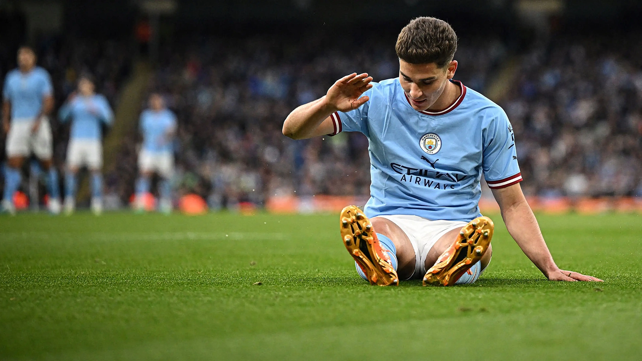 Julian Alvarez slaps the ground in frustration during a recent Manchester City fixture. 
