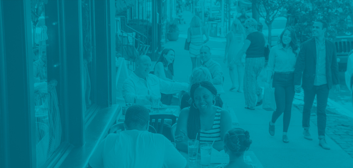 Manayunk residents walk and eating at restaurant