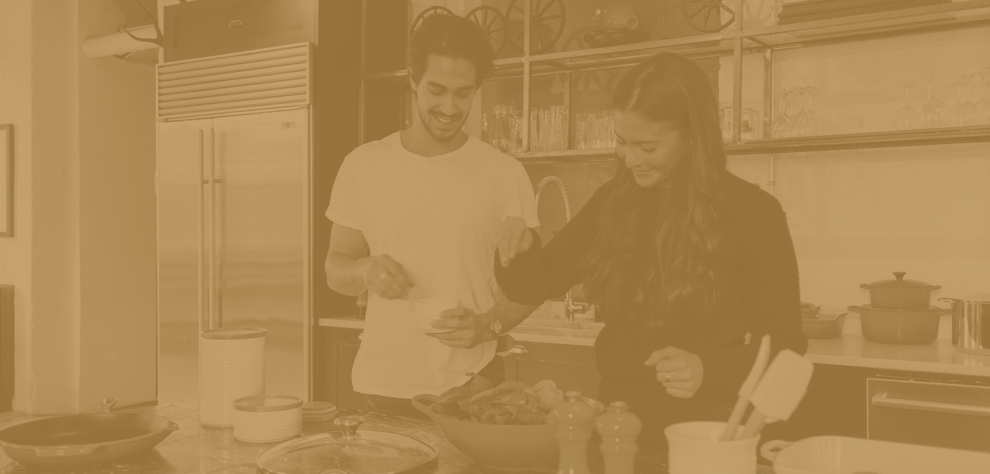 Man and woman cooking in kitchen