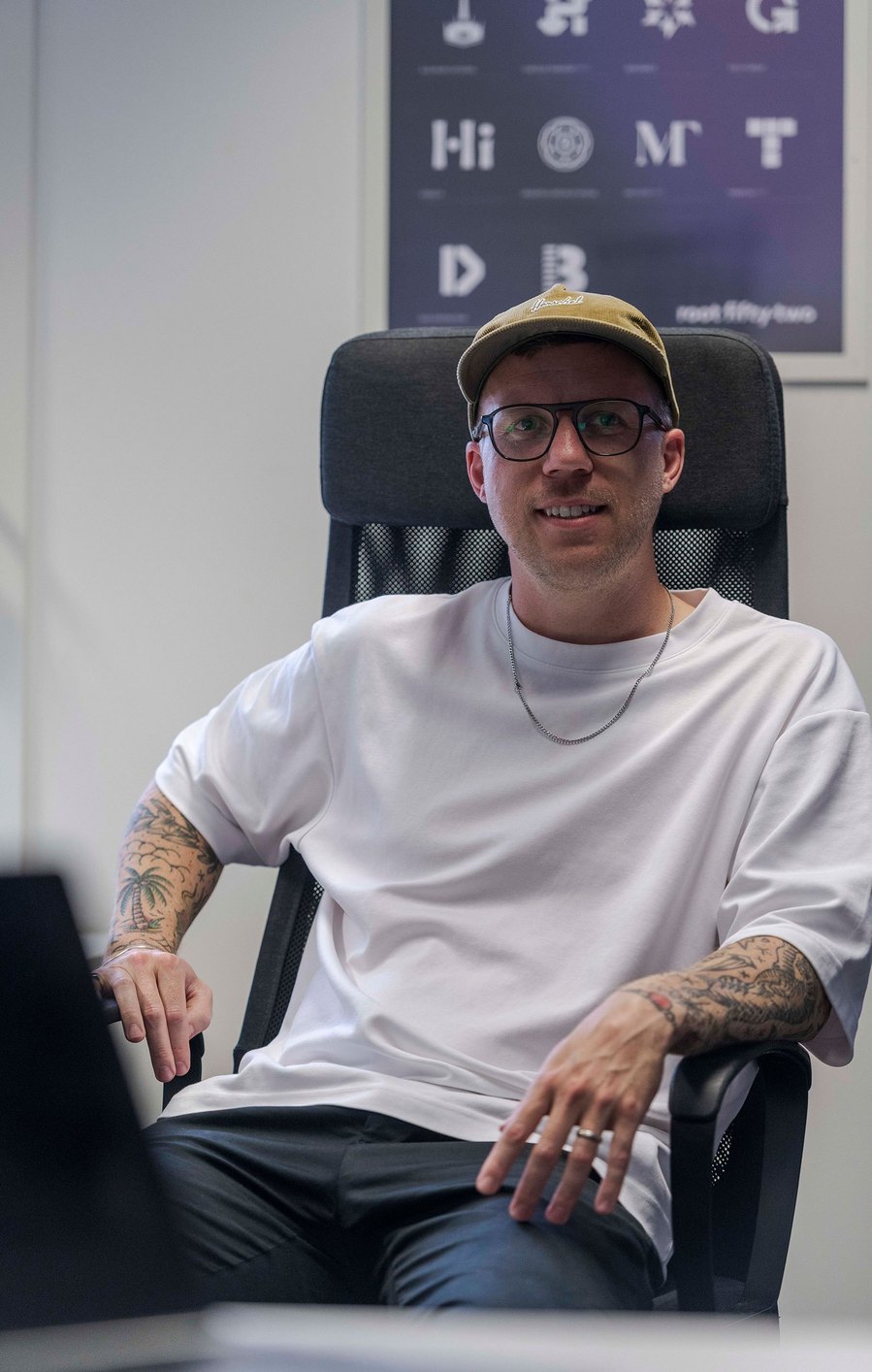 commercial lifestyle and office lifestyle, workplace, team member relaxes in office chair