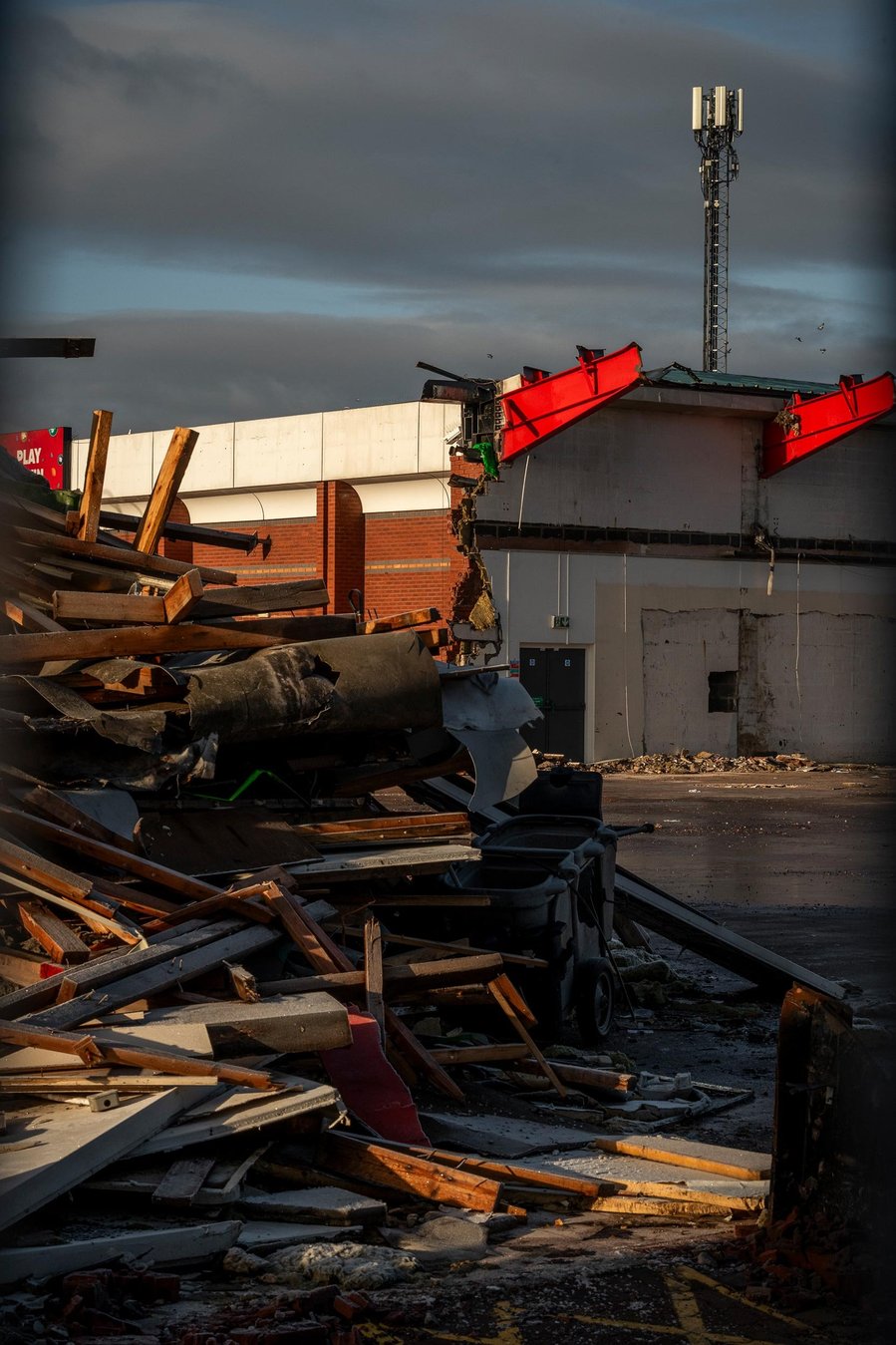construction site, shopping centre, demolition and rubble, evening light