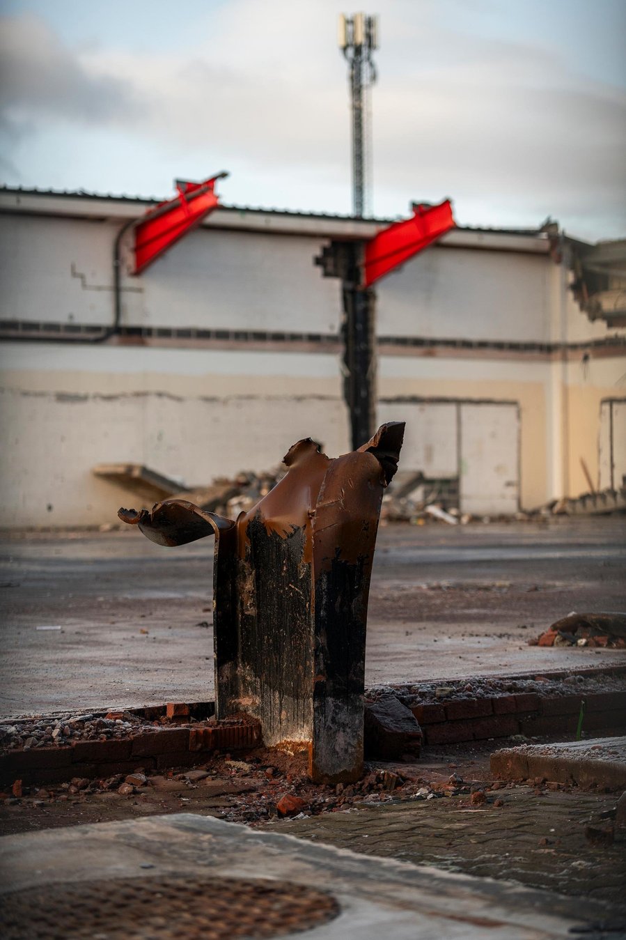 construction site, shopping centre, demolition and rubble, evening light on girders