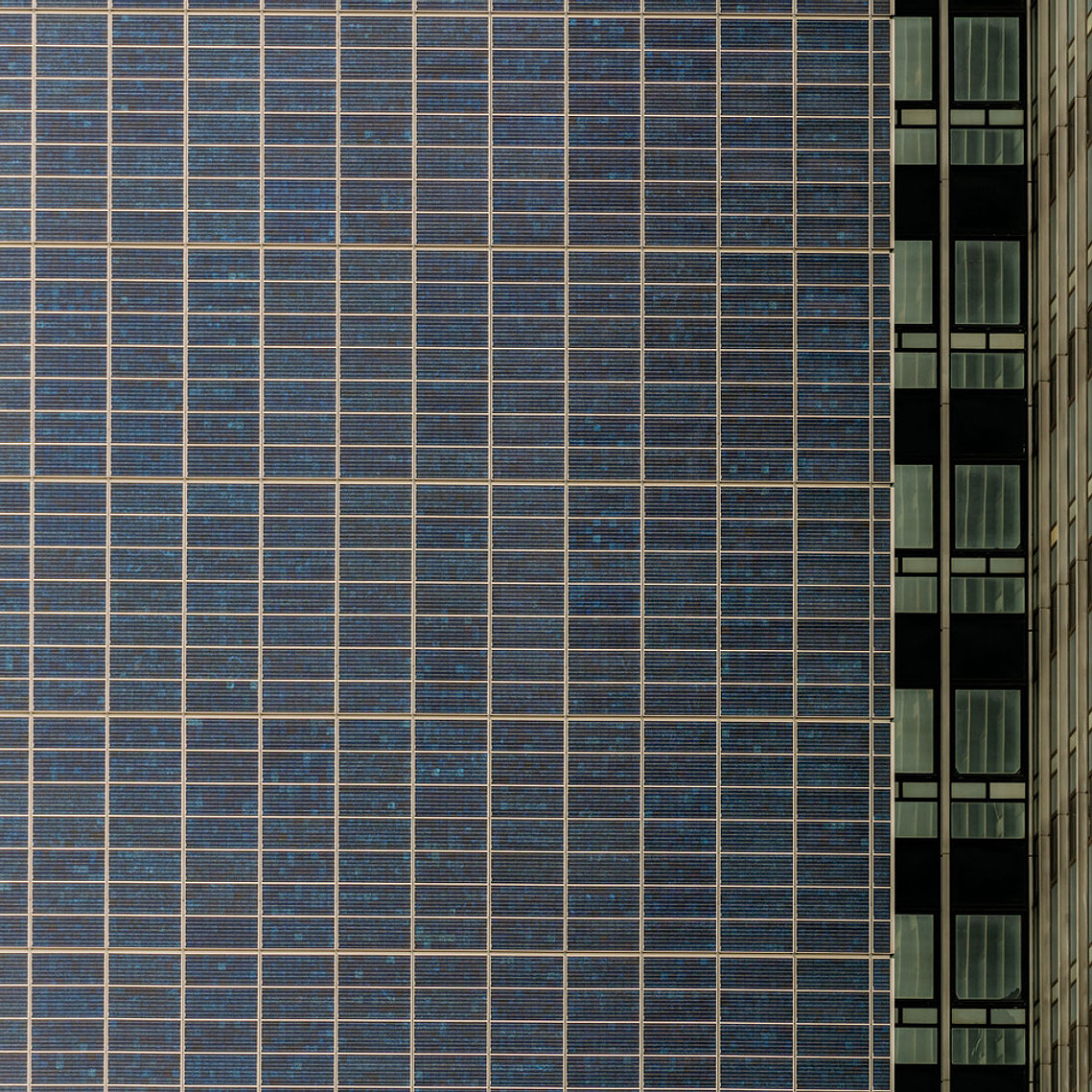 Abstract architecture photography - Light and shadow playing across the CIS Building façade.  