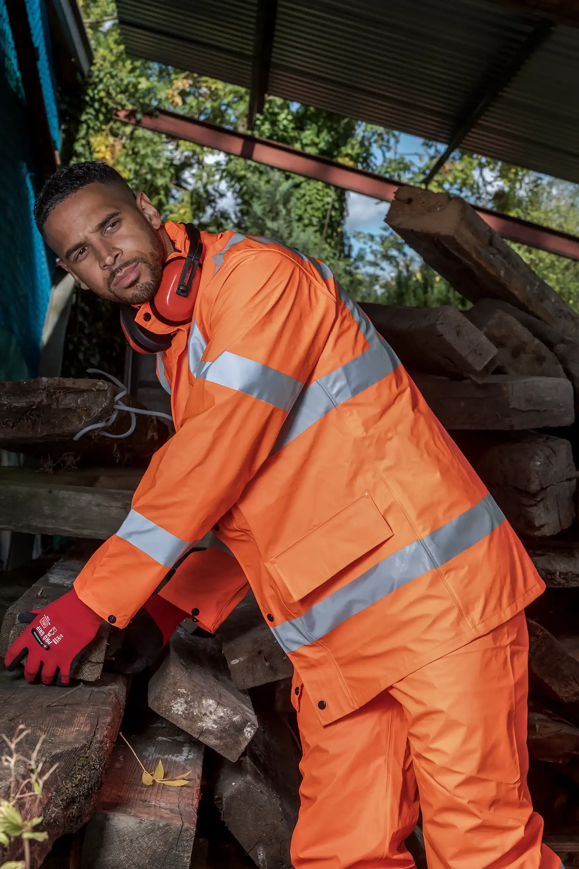 Commercial photography for brands showing ProDec trade products in use, model wears PPE and poses as worker 