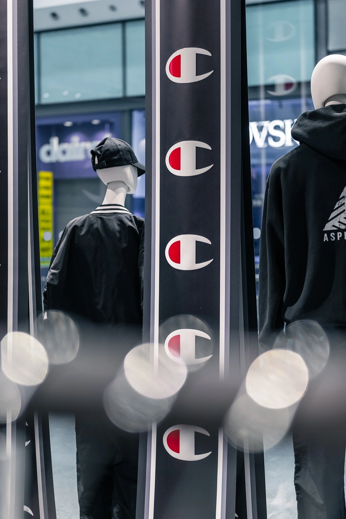 Commercial interior photograph of the Champion store window from inside 