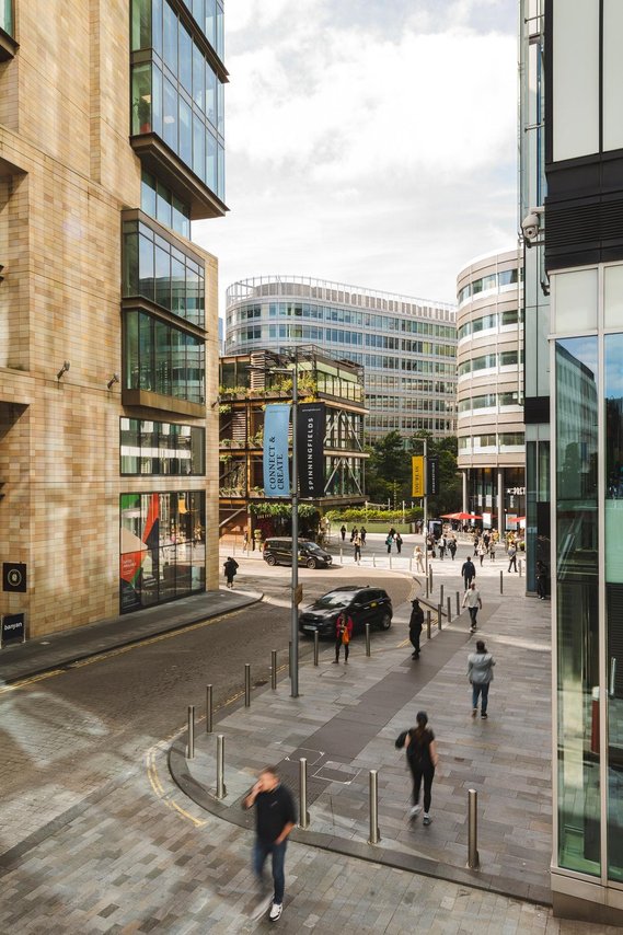 URBAN LIFESTYLE AND LOCAL AREA PHOTOGRAPHY OF SPINNINGFIELDS, MANCHESTER,architecture photography that shows the high-rise buildings with cars and people 