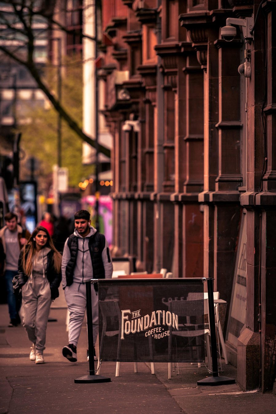 placemaking photography. manchester. norther quarter. architecture. shoppers walk along pavement