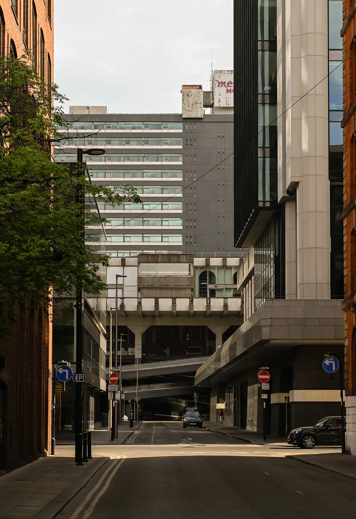 Image showing street scene in Manchester and examples of layered architecture 
