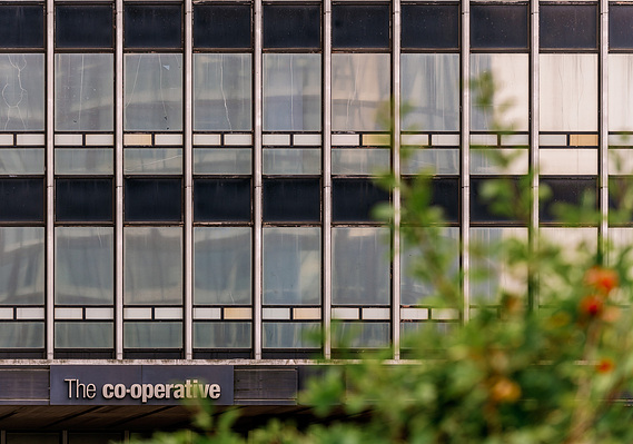 Architecture photography for Manchester iconic building - photography case study cover showing a close up of CIS building fascia
