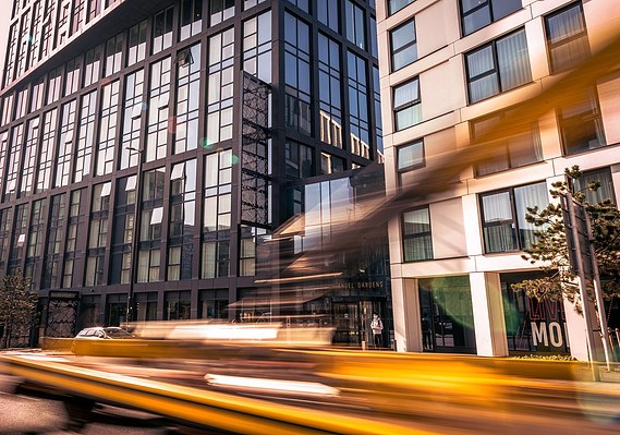 Case Study Photography Cover For Urban Lifestyle And Local Area Photography Around Manchesters Northern Quarter showing a hotel with a blurred car in foreground 