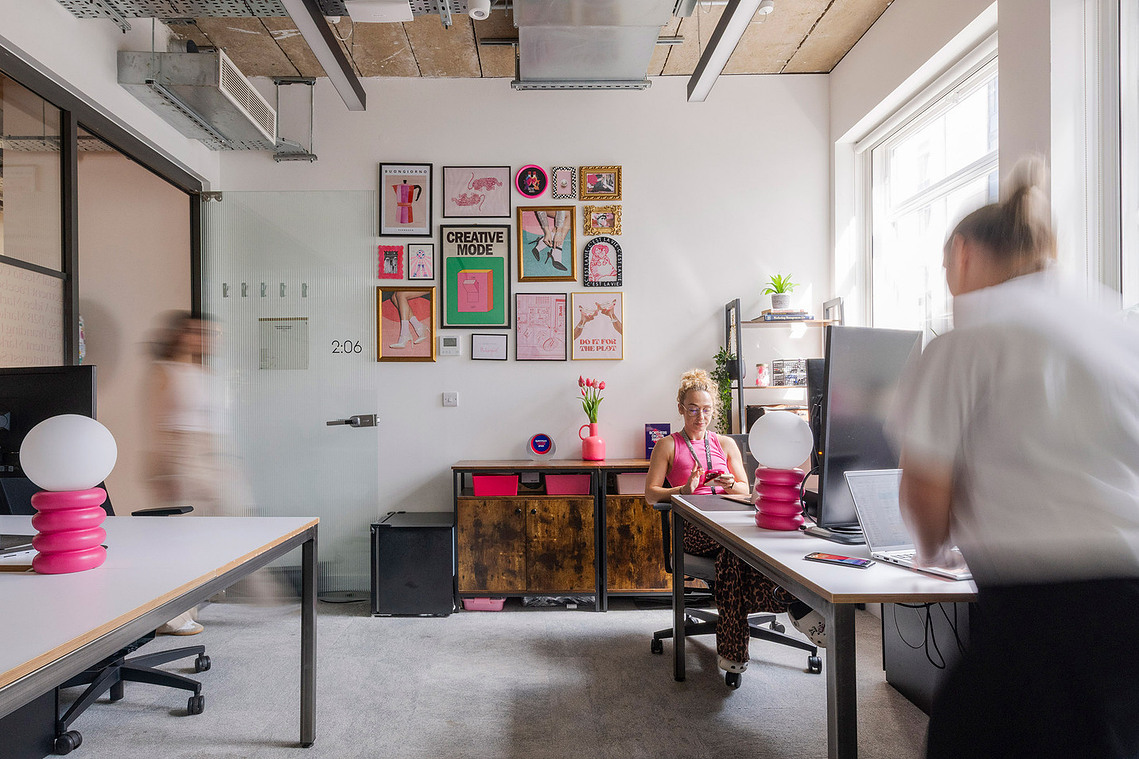 Commercial interiors photography of private office at Clockwise Leeds with members working naturally