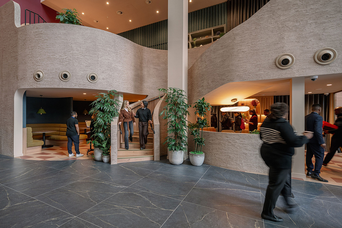 Lifestyle photography of professionals showing architecture at 3 Hardman Street reception in Manchester
