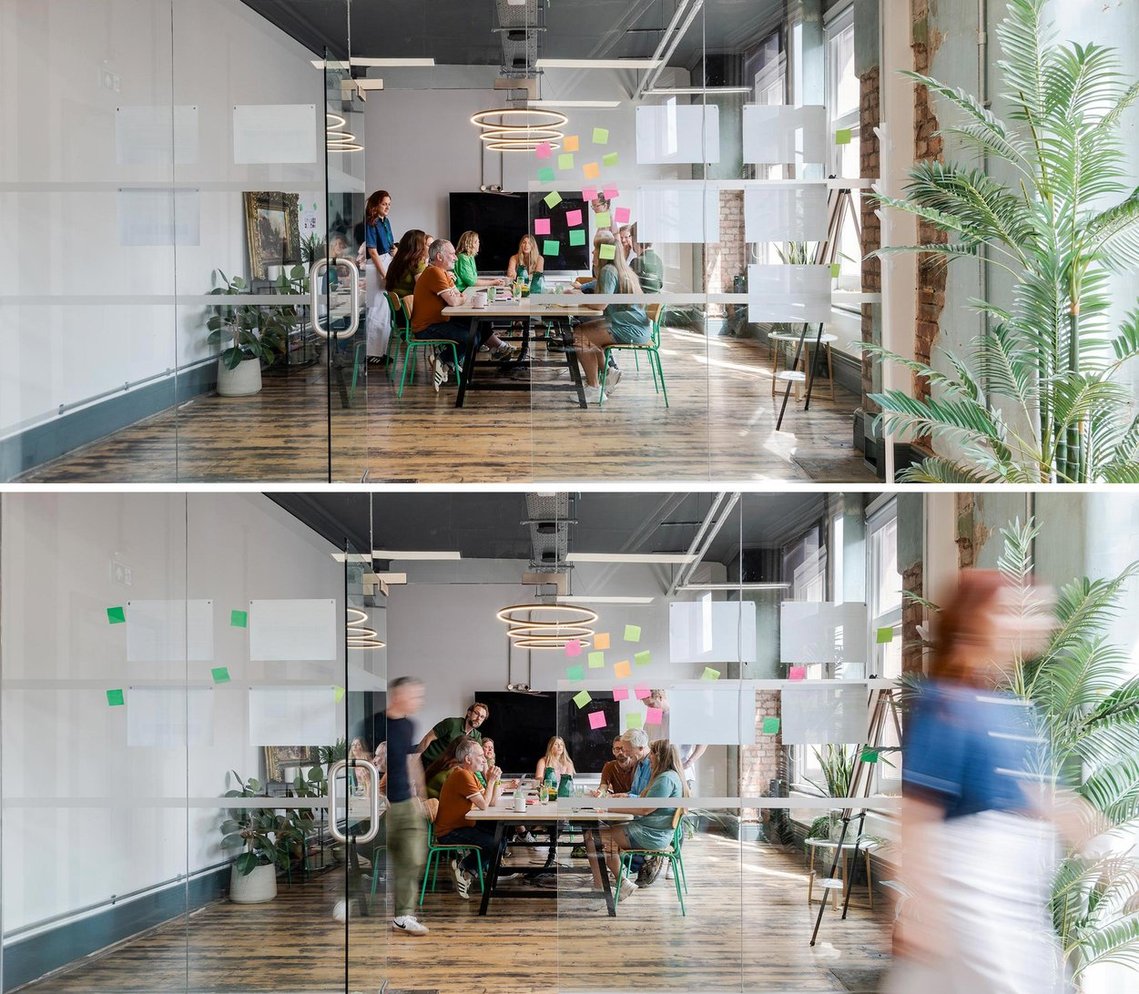 commercial lifestyle photography showing staff in a workplace, wide shots on meeting room with team members gathered and chatting