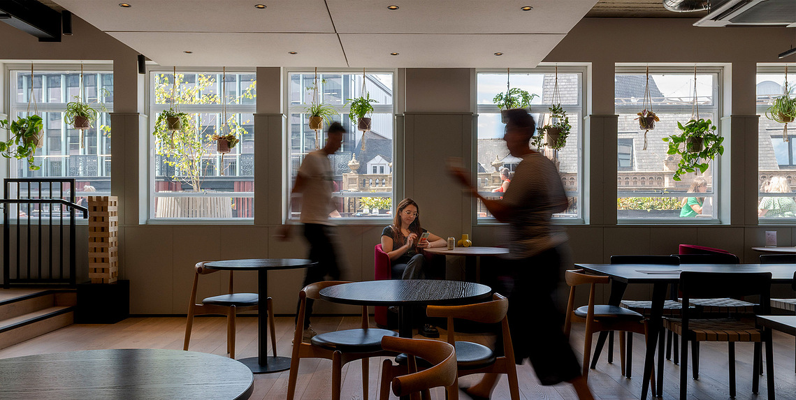 A candid look at members enjoying lunch, highlighting Clockwise’s balance of professionalism and warmth